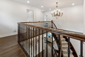 Modern 4BR Retreat with Premium Comforts and Parking